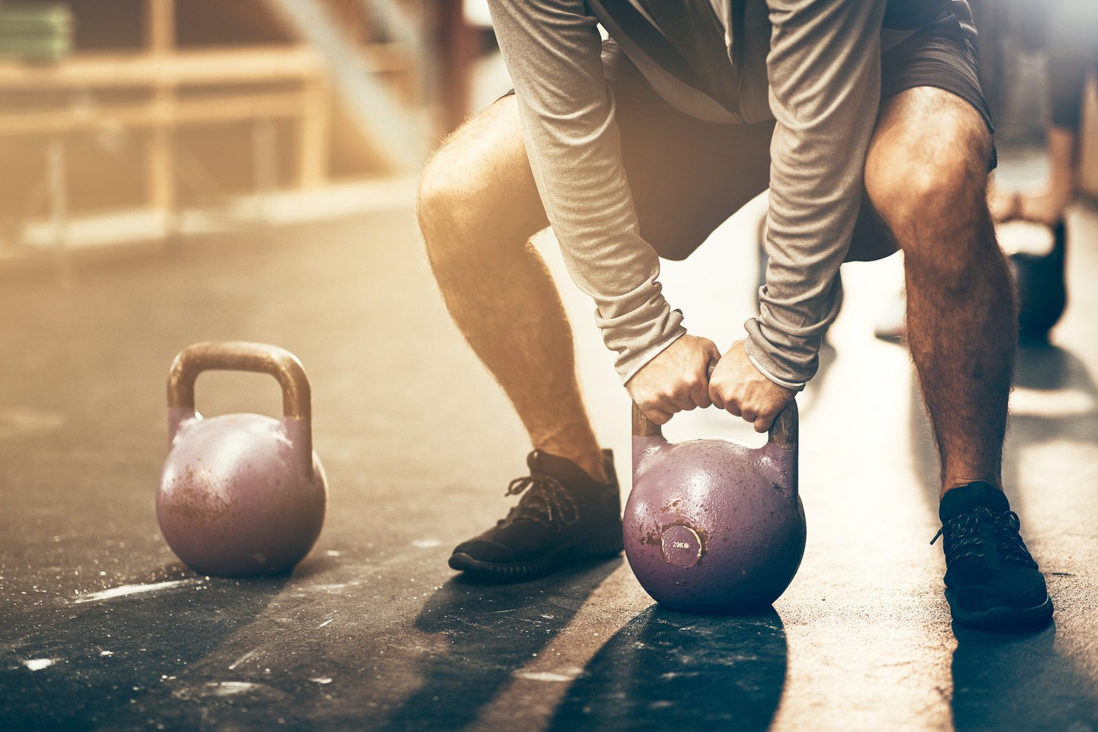 Participant performing strength exercises in the Third Level Workout program.